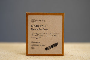 Label of LycanCo Bushcraft Bar Soap listing natural ingredients, including essential oils and aloe vera, on eco-friendly packaging.