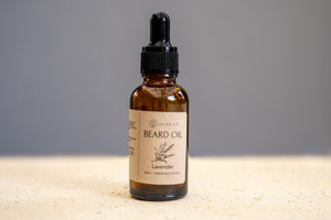 Sleek bottle of LycanCo Lavender Beard Oil, emphasizing its calming aroma.