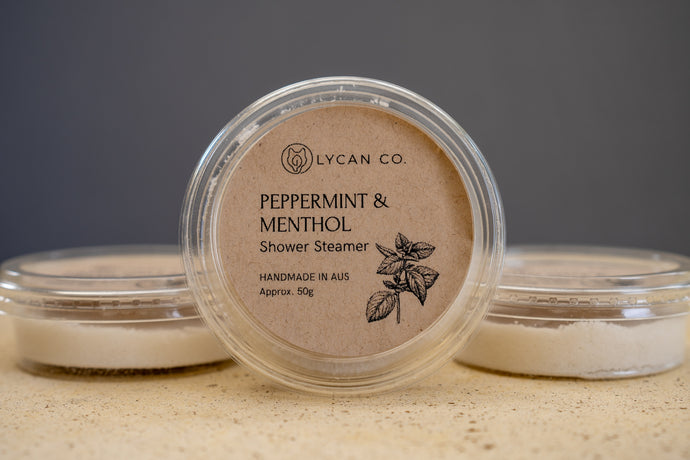 LycanCo Peppermint & Menthol Shower Steamer presented in see-through packaging, ideal for a stimulating and minty fresh shower.