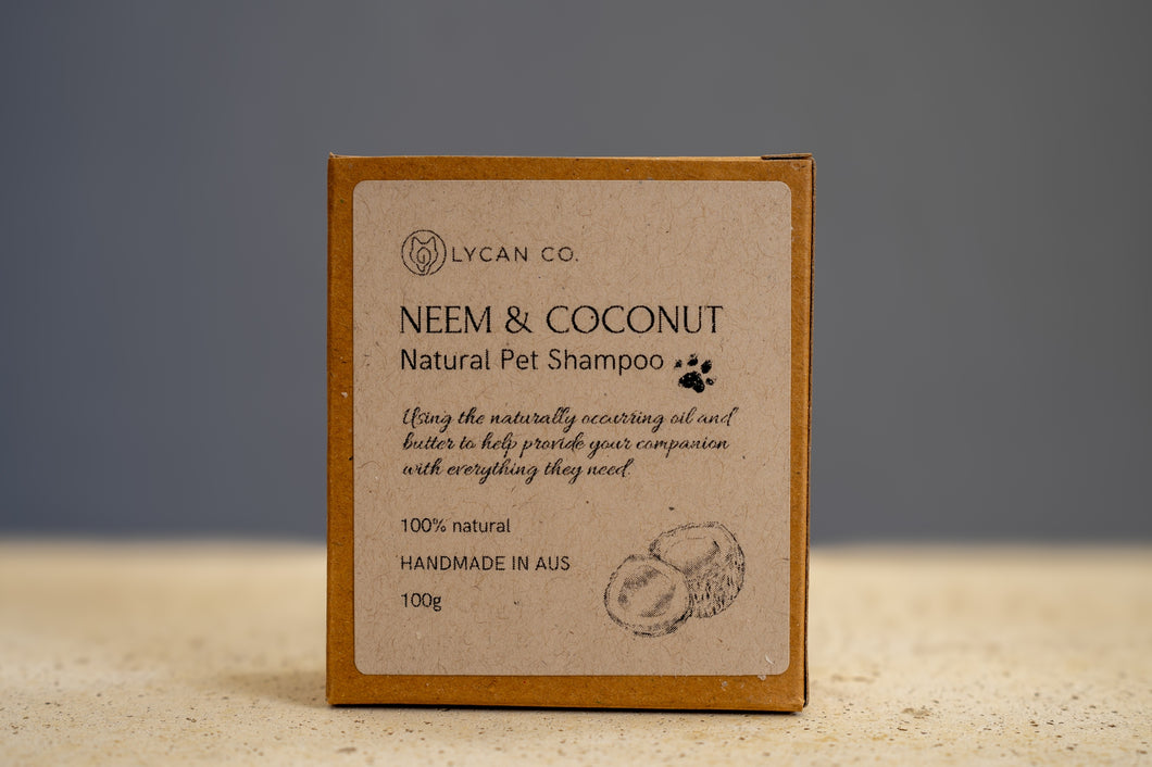 Label of LycanCo Neem and Coconut Shampoo Bar listing natural ingredients like neem and coconut on eco-friendly packaging designed for pets.