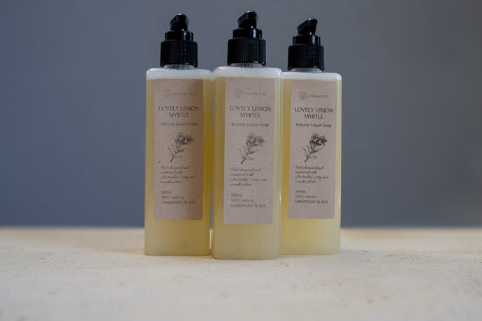 Three bottles of LycanCo Lovely Lemon Myrtle Liquid Soap on a neutral background, highlighting natural and fresh ingredients.